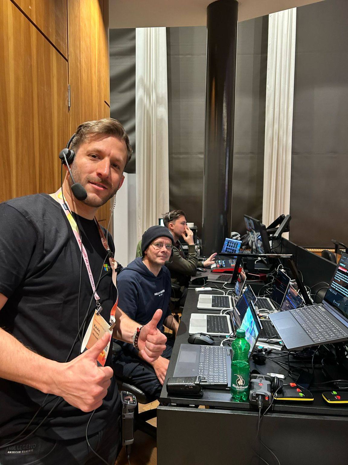 The show calling team at the front of house desks