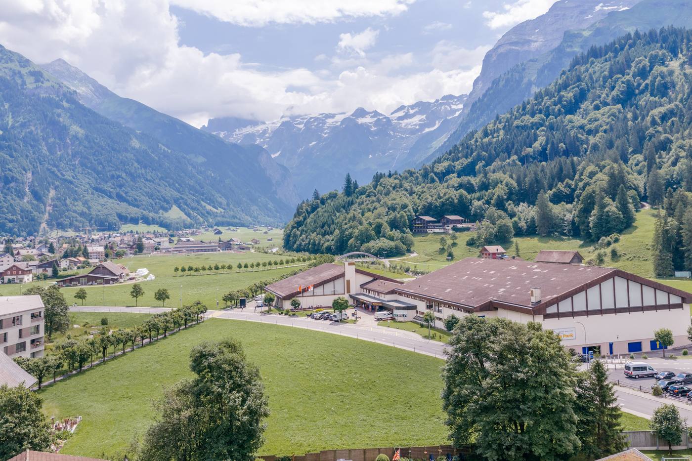 Aerial view of the tennis hall conference venue in the Engelberg valley