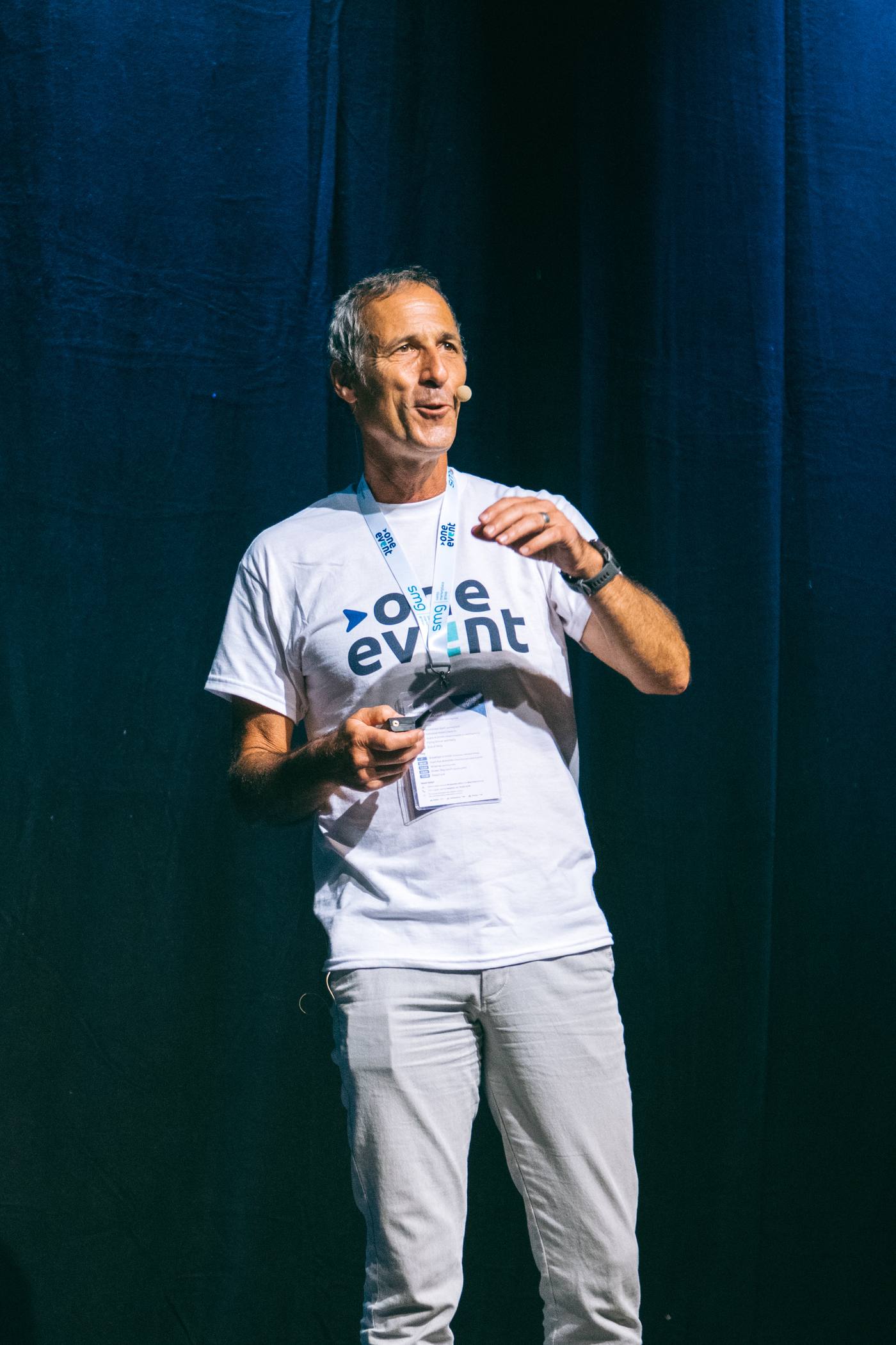 Speaker on stage at the One Event conference
