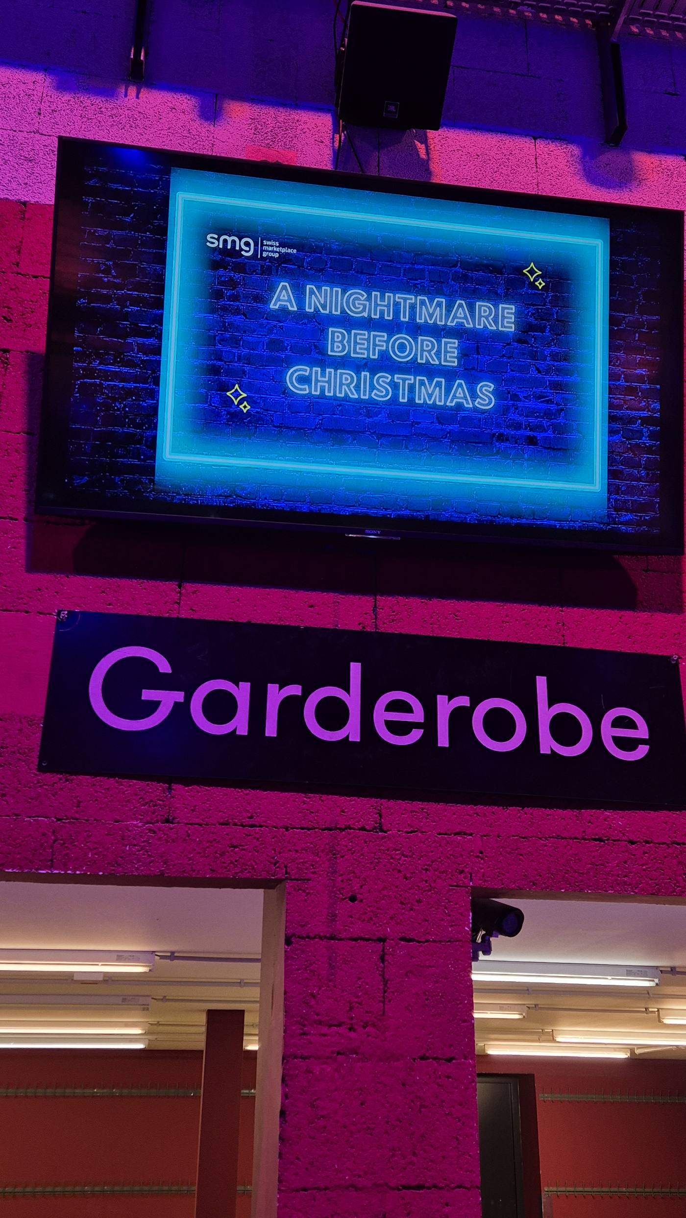 Neon Nightmare Before Christmas sign at the venue entrance
